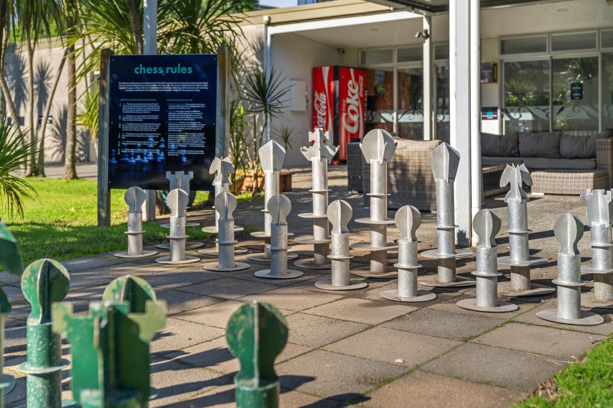Tasman Holiday Parks - Waihi Beach Exterior foto Chess set at the entrance of the library